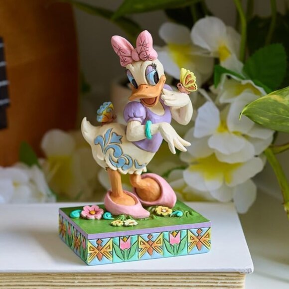 61+QLctdjlL._AC_UF894,  Disney Traditions Collection Daisy Duck with Flowers and Butterflies Figurine